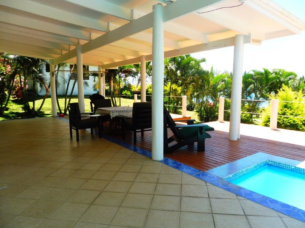The pool deck of a Bayview Garden Villa at Daku Resort, Savusavu.