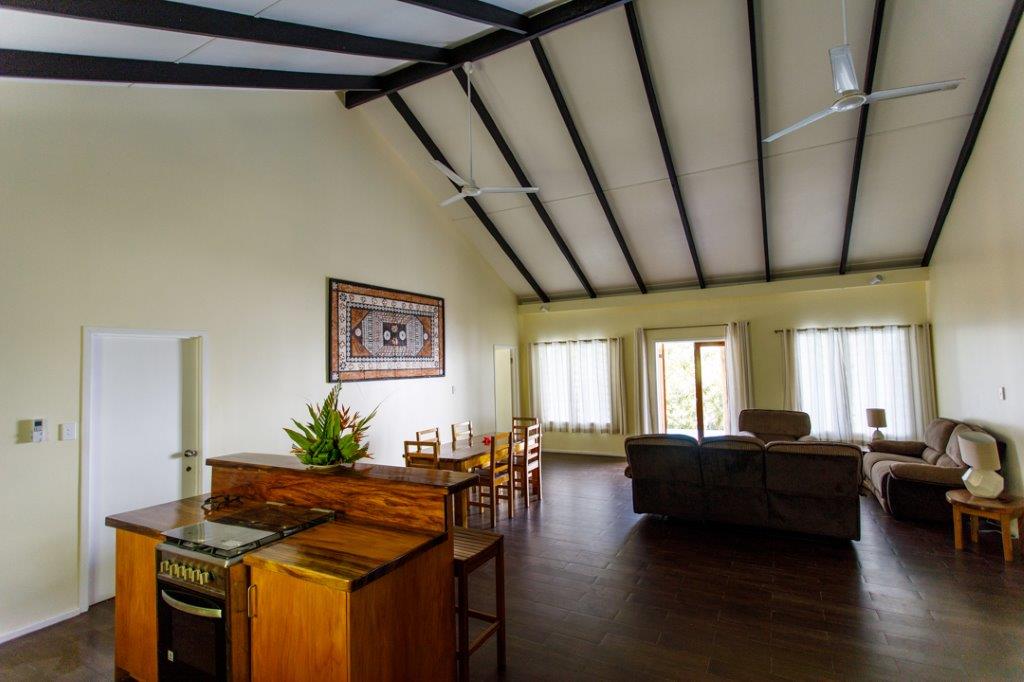 The main lounge and kitchen of the Infinity Villa at Daku Resort, Savusavu.