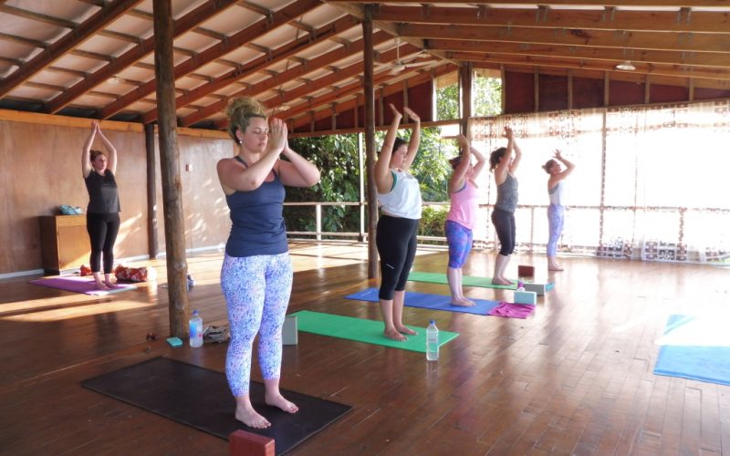 Amy leads a yoga class on the deck at Daku Resort, Savusavu.